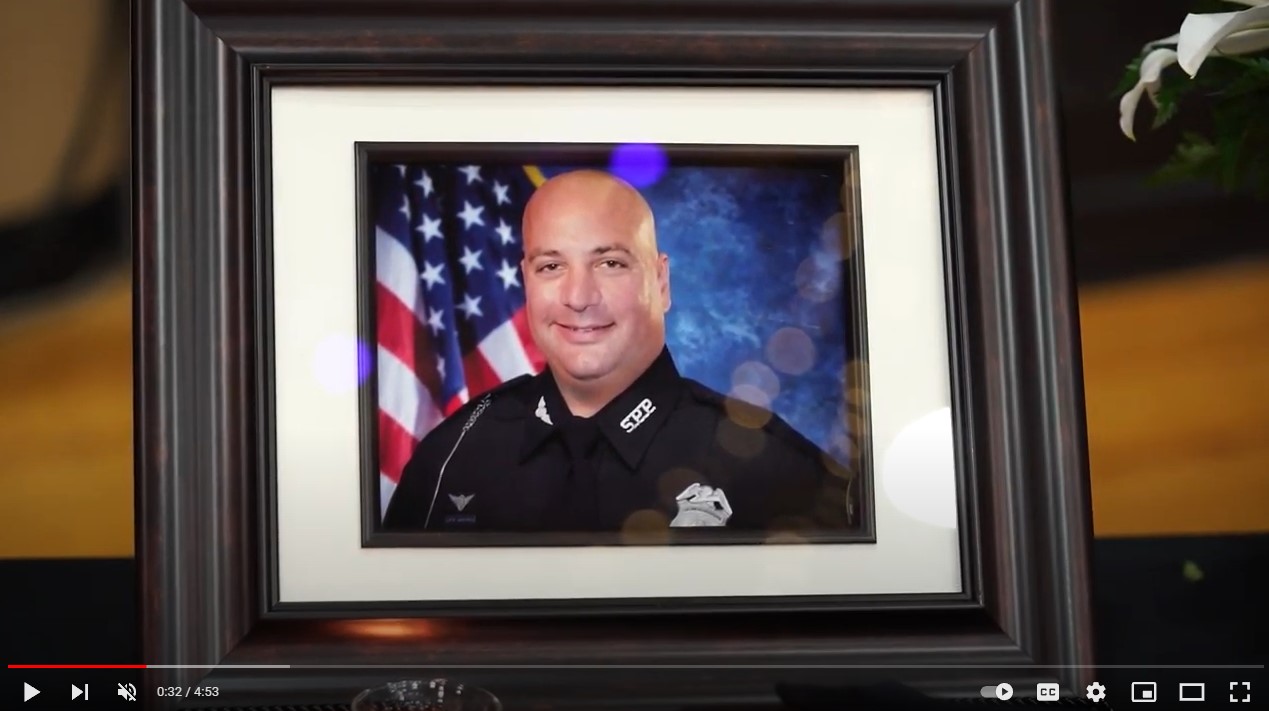 framed picture of Officer Michael Weiskopf youtube thumbnail